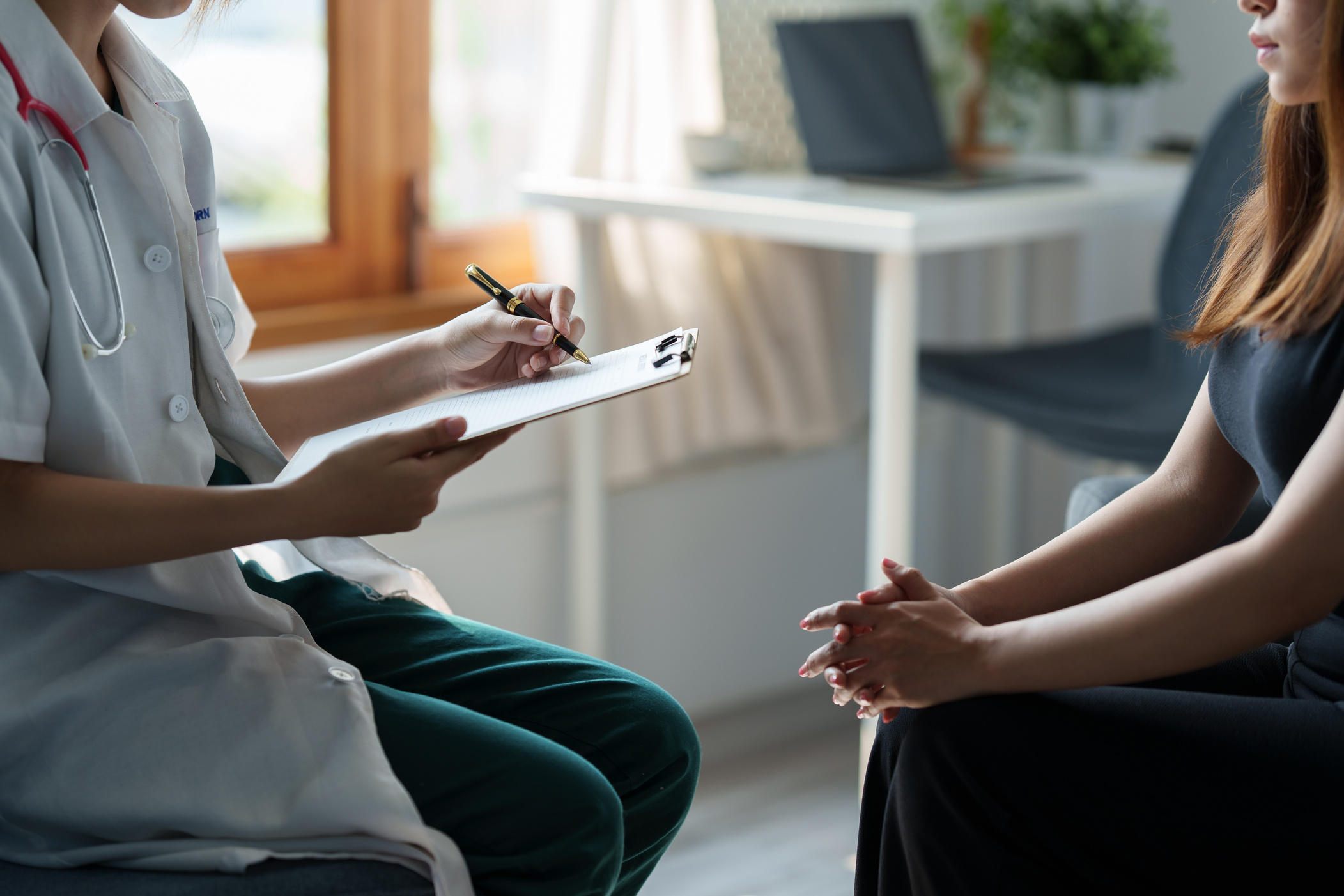 Doctor Consulting Patient and Offer Healthy Food Nutrition at Cl