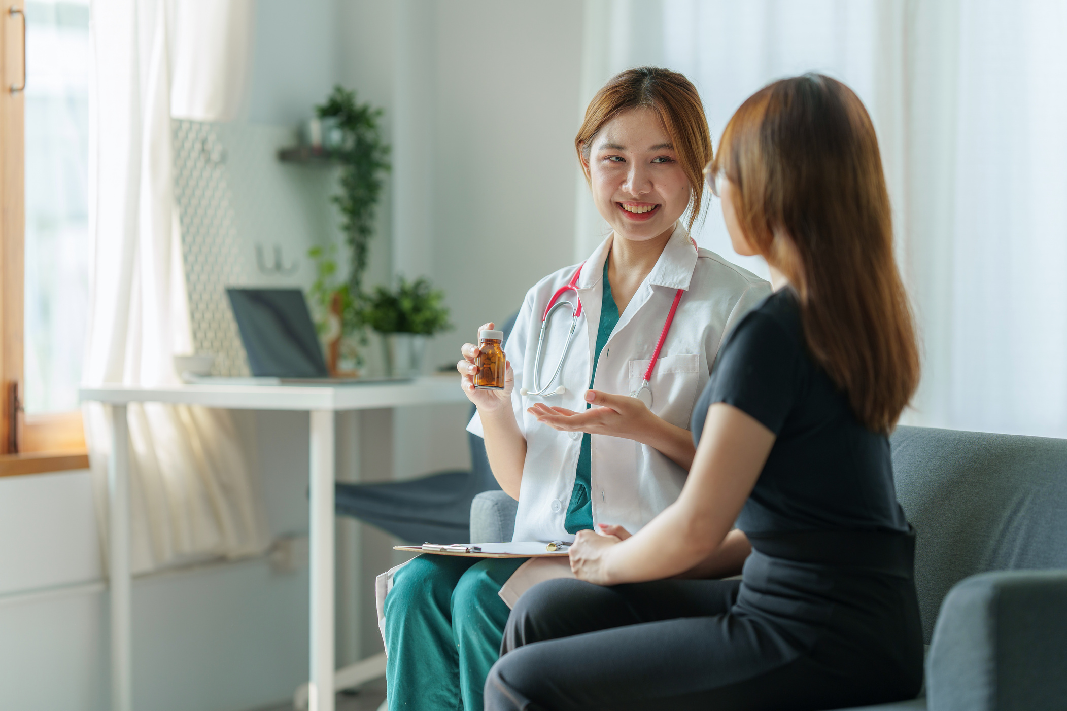 Doctor Consulting Patient and Offer Healthy Food Nutrition at Cl